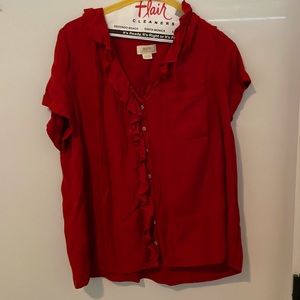 Red, button-down, short-sleeved shirt. Maeve brand from Anthropologie.